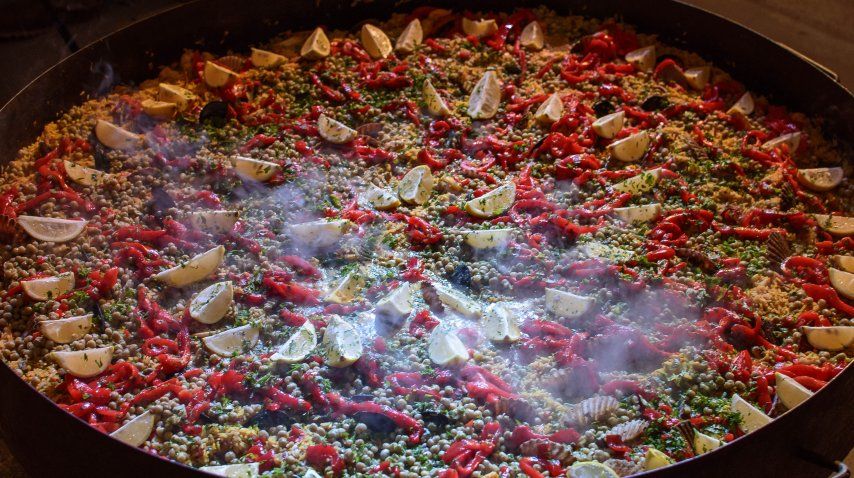 Uno de los plátos clásicos del lugar: la paella<br>